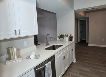The palms of clearwater apartments fully equipped kitchen (virtually staged